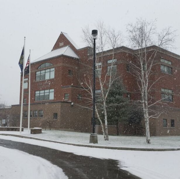 Image of a snowy courthouse in New Hampshire. Garrison Law serves  the state of New Hampshire for both criminal and civil cases.